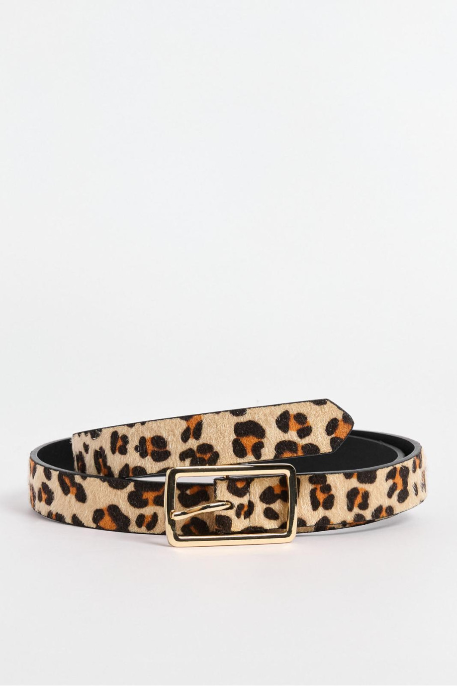 Cinturón femenino, animal print con hebilla metálica.
