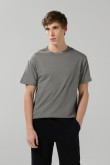 Camiseta manga corta unicolor con hombro rodado en algodón