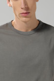 Camiseta manga corta unicolor con hombro rodado en algodón