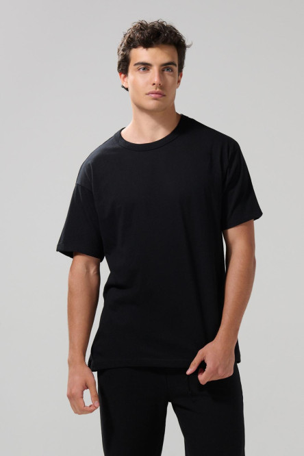 Camiseta manga corta unicolor con hombro rodado en algodón