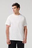 Camiseta manga corta unicolor con hombro rodado en algodón