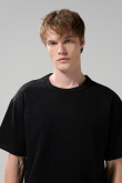 Camiseta oversize unicolor en algodón cuello redondo