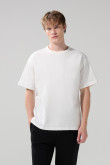 Camiseta oversize unicolor en algodón cuello redondo