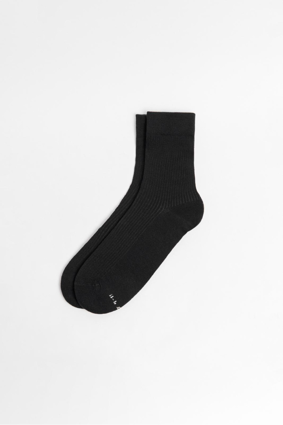 Medias unicolores largas con texturas y elástico