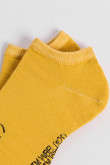 Medias tobilleras amarillas con diseño de Looney Tunes