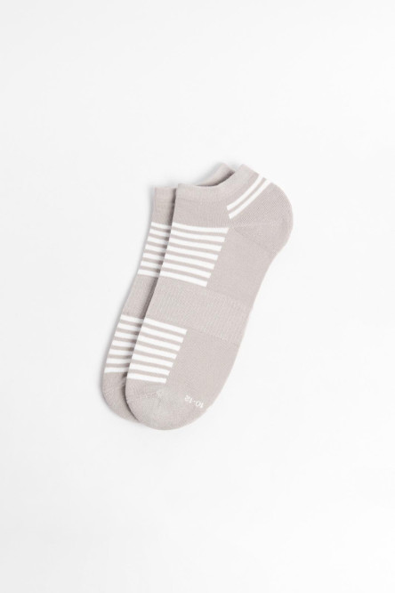 Medias unicolores tobilleras con diseños de rayas localizadas