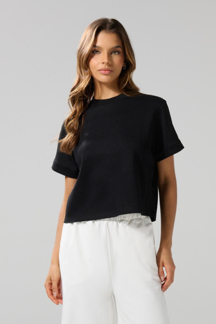 Camiseta crop top unicolor con doblez en puños