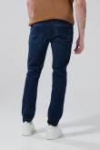 Jean azul oscuro skinny con tiro bajo y 5 bolsillos