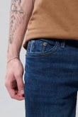 Jean azul oscuro skinny con tiro bajo y 5 bolsillos