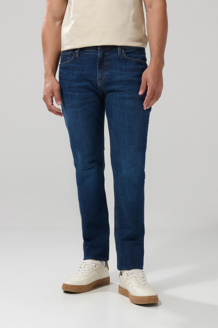 Jean slim tiro bajo azul oscuro con costuras en contraste