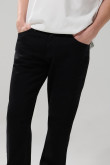 Jean slim tiro bajo negro con ajuste ceñido y bolsillos