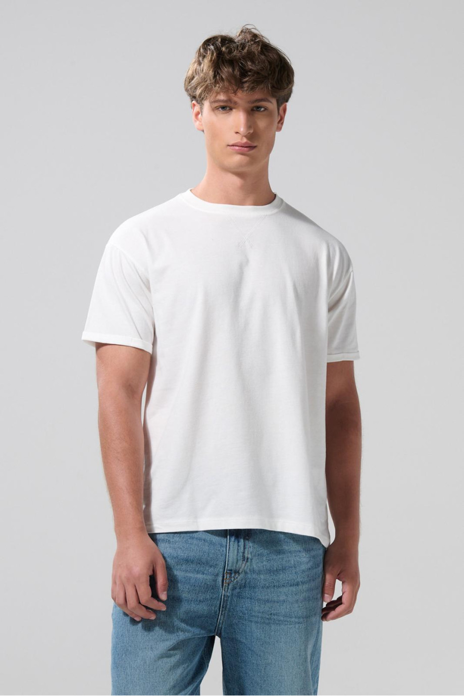 Camiseta unicolor en algodón manga corta con costura cruzada