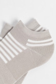 Medias unicolores tobilleras con rayas localizadas