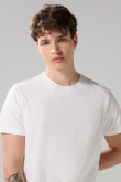 Camiseta cuello redondo unicolor con doblez en puños