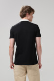 Camiseta unicolor polo con manga corta y contrastes