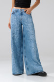 Jean palazzo azul medio con diseños, tiro alto y bota ancha