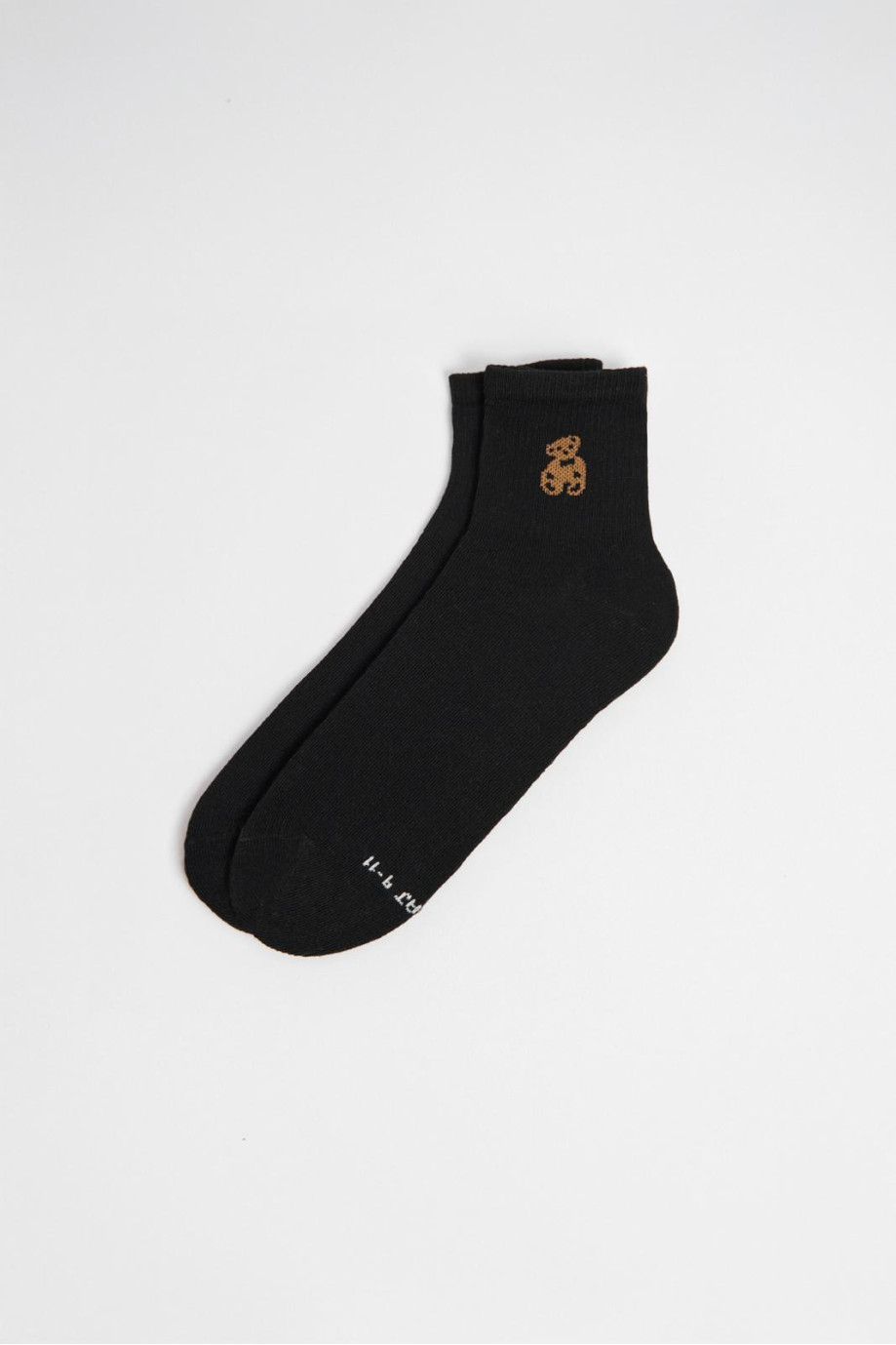 Medias cortas unicolores con diseño de osito