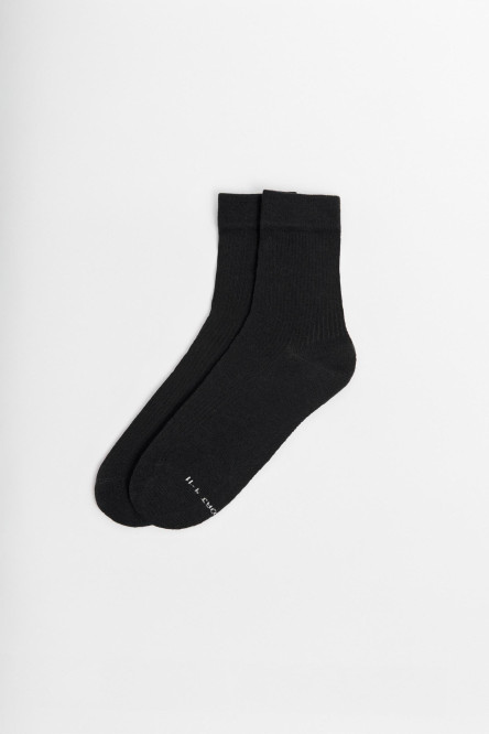 Medias unicolores largas con texturas acanaladas