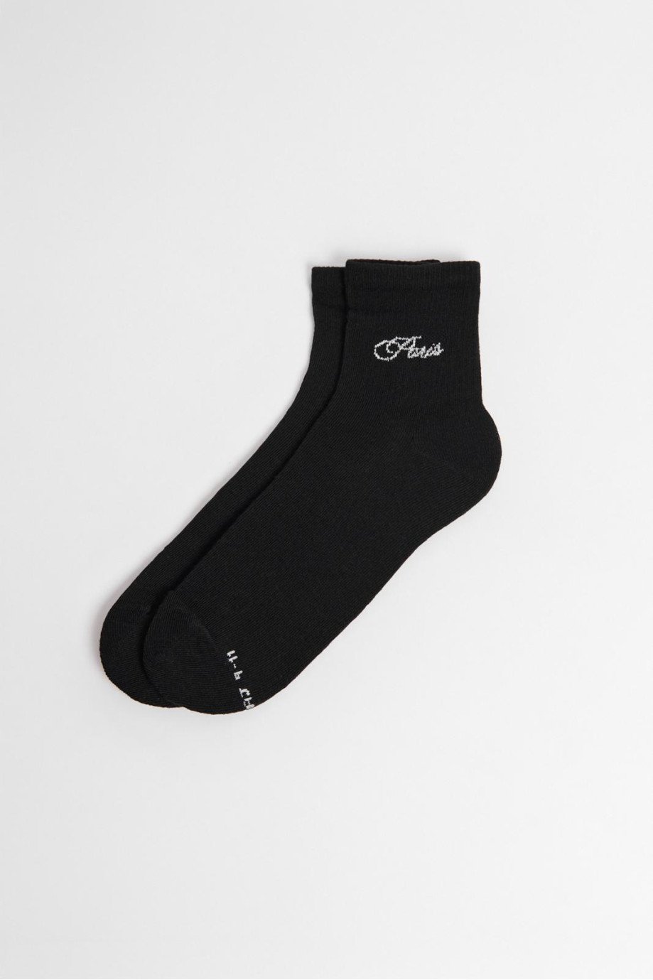 Medias cortas unicolores con texto college en costado