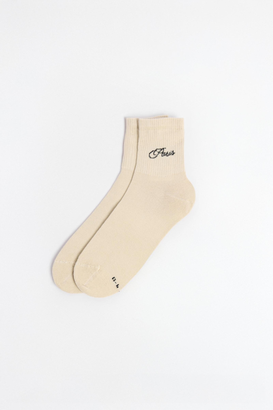 Medias cortas unicolores con texto college en costado