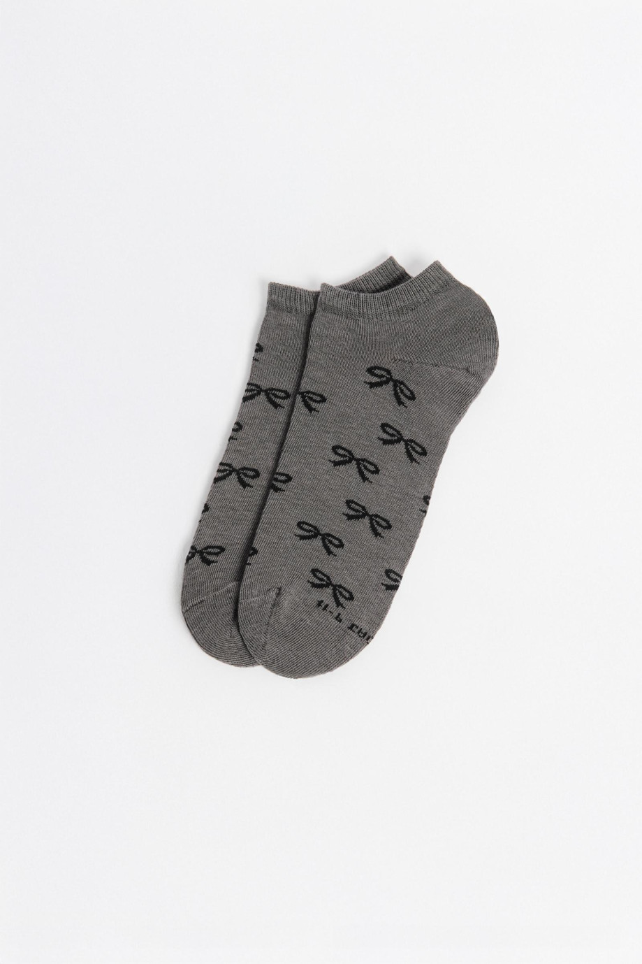 Medias unicolores tobilleras con diseño de moños