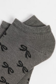 Medias unicolores tobilleras con diseño de moños