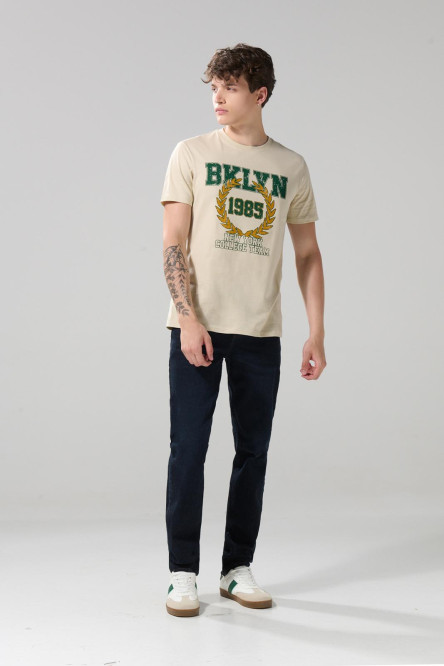 Jean azul intenso tiro bajo slim con 5 bolsillos