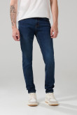Jean skinny azul oscuro ceñido con bolsillos y tiro bajo