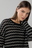 Suéter negro cuello redondo tejido con diseños
