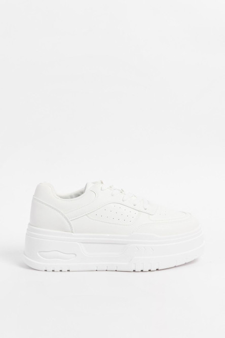 Zapatillas suela de plataforma de caucho color caramelo.