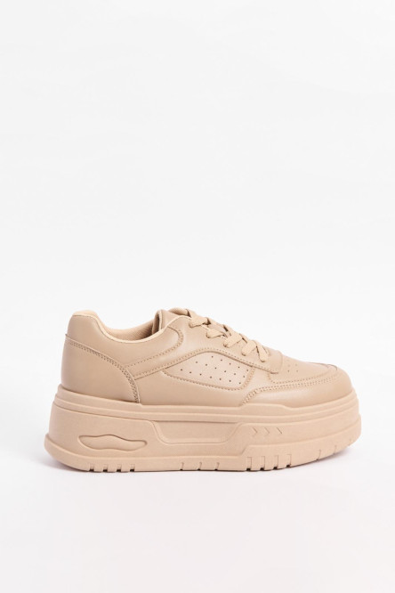 Zapatillas suela de plataforma de caucho color caramelo.