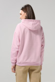 Buzo rosado claro oversize con arte college y capota