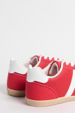 Tenis casuales unicolores con cortes y contrastes