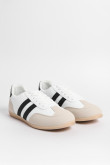 Tenis casuales unicolores con cortes y contrastes