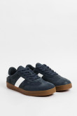 Zapatillas de estilo clásico, suela de caucho natural de perfil bajo.