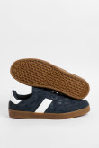 Zapatillas de estilo clásico, suela de caucho natural de perfil bajo.
