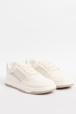 Tenis casuales cremas con perforaciones y contraste posterior