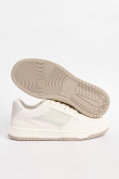 Tenis casuales cremas con perforaciones y contraste posterior