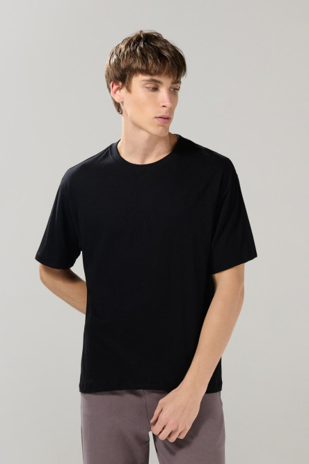 Camiseta en algodón unicolor manga corta con hombro rodado
