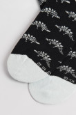 Medias unicolores cortas de dinosaurios con contrastes