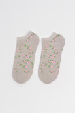 Medias unicolores tobilleras con diseño de flores.