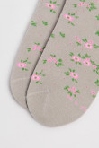 Medias unicolores tobilleras con diseño de flores.