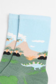 Medias unicolores largas con diseños de dinosaurios.
