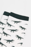 Medias unicolores largas con diseños de dinosaurios.