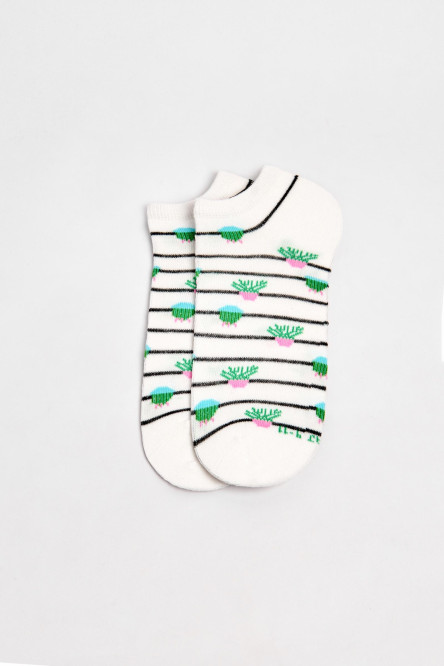 Medias unicolores tobilleras con diseño de plantas.