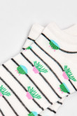 Medias unicolores tobilleras con diseño de plantas.