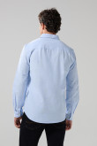 Camisa con cuello button down unicolor y manga larga