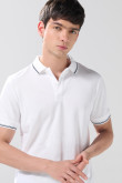 Camiseta polo manga corta unicolor con botones en frente