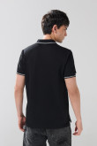Camiseta polo manga corta unicolor con botones en frente