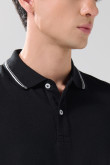 Camiseta polo manga corta unicolor con botones en frente